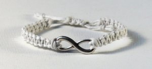 white_square_knot_hemp_bracelet_w_infinity_charm_by_eggmonkey-d6gx7qx
